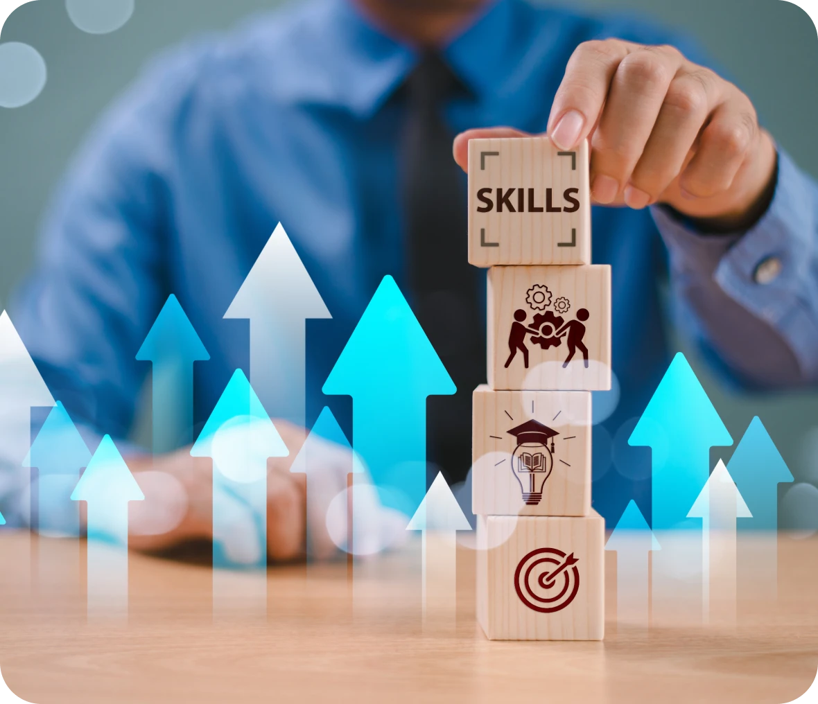 Man stacking skill-themed wooden blocks.