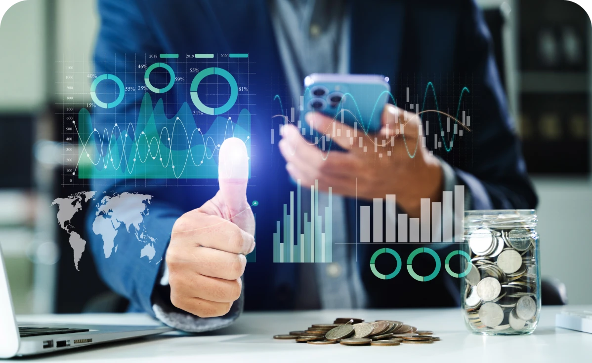 Businessman with smartphone and financial graphics.